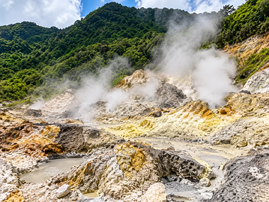 Steam venting from the yellow mineral ground at the sulphur springs